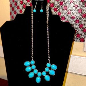 Matching necklace, earrings, and bracelet